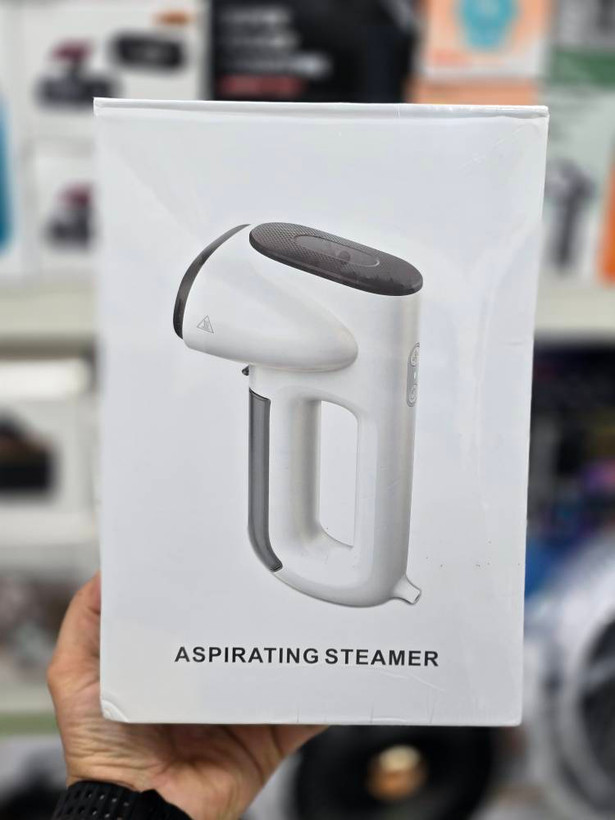 دستگاه اتو بخار مکشی (Aspirating Steamer / Suction-Type Ironing Machine