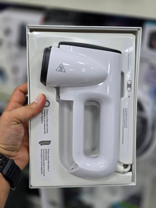 دستگاه اتو بخار مکشی (Aspirating Steamer / Suction-Type Ironing Machine